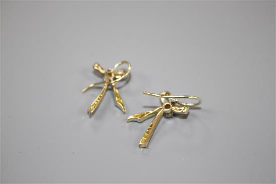 A pair of 20th century yellow metal and diamond set ribbon bow drop earrings, bow 22mm, gross weight 3.8 grams.